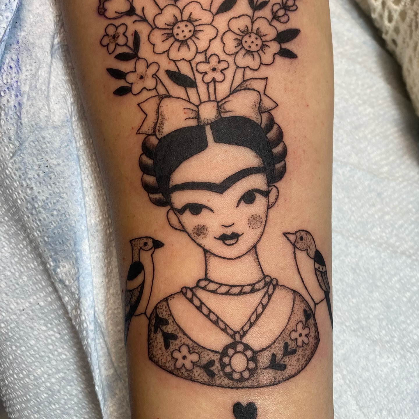 Frida Kahlo portrait realism tattoo on the forearm by Melissa Contreras