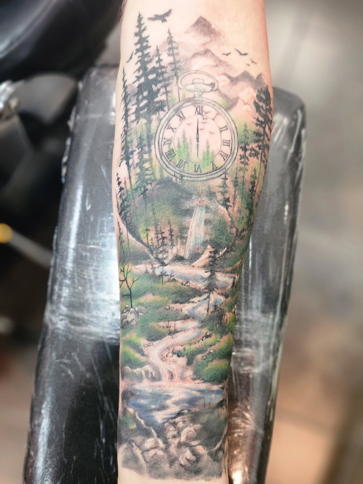 Forest landscape realism tattoo on the forearm by Samantha Von Zombia, Saint Paul, Minnesota