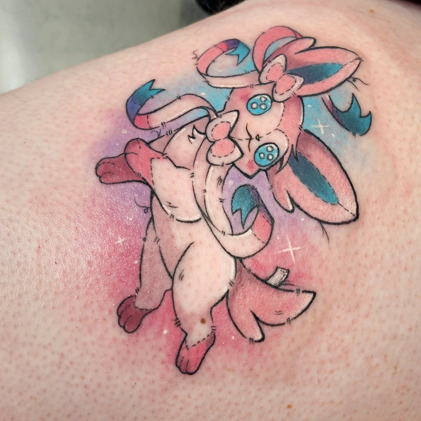 Jigglypuff new school tattoo on the shoulder by Diane Maya