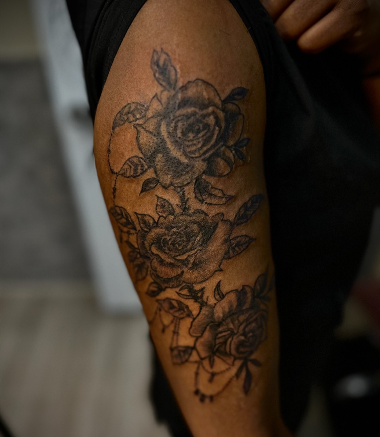 Roses black and grey tattoo on the thigh by Ink’d by Reina 🖤, Colorado Springs, Colorado