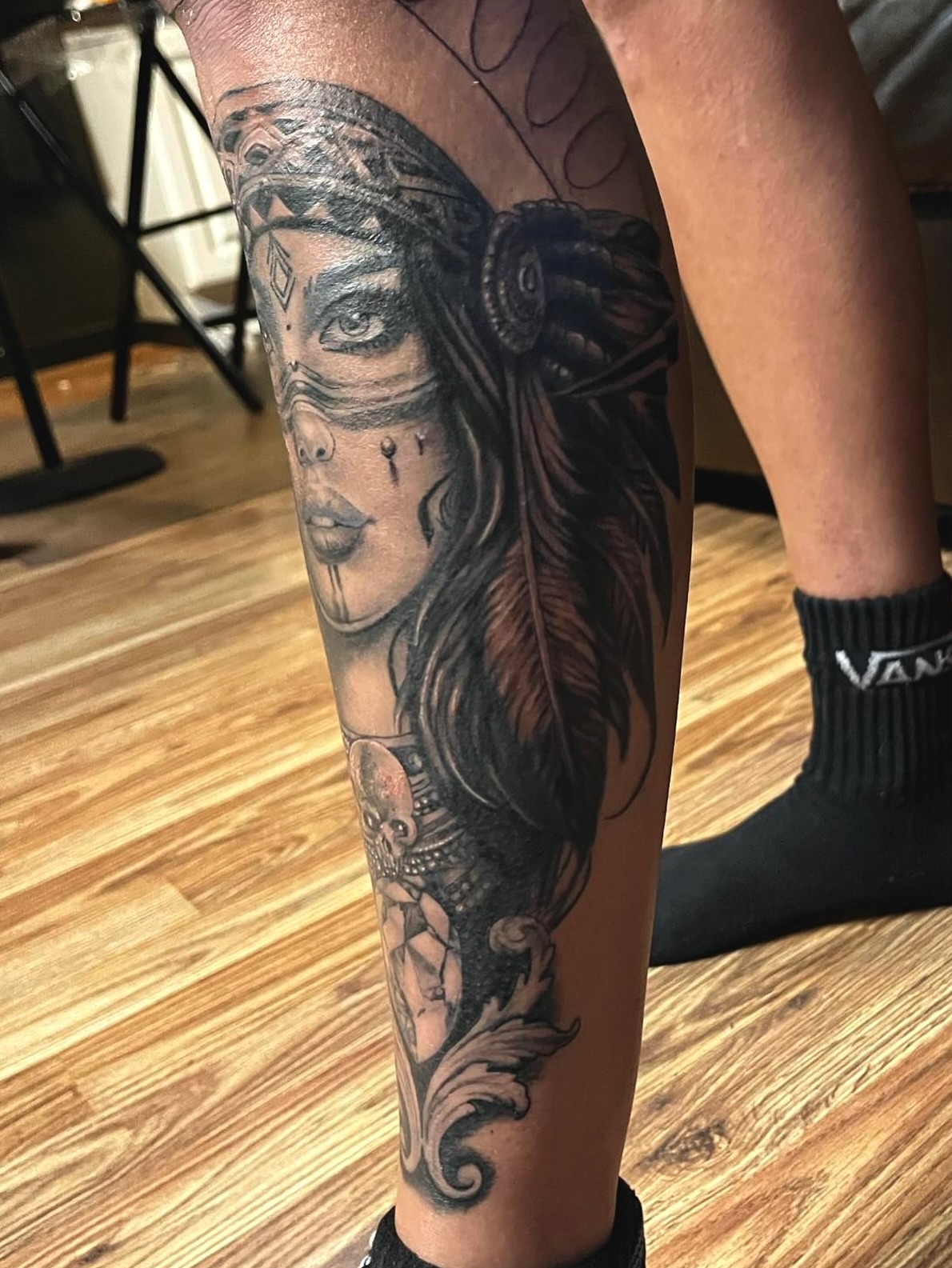 Indian woman realism tattoo on the leg by Colt