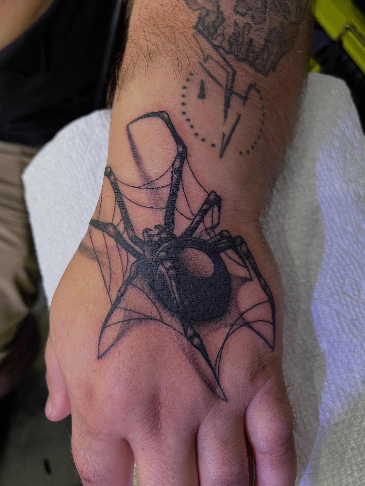 Spider geometric tattoo on the hand by Baung Ben