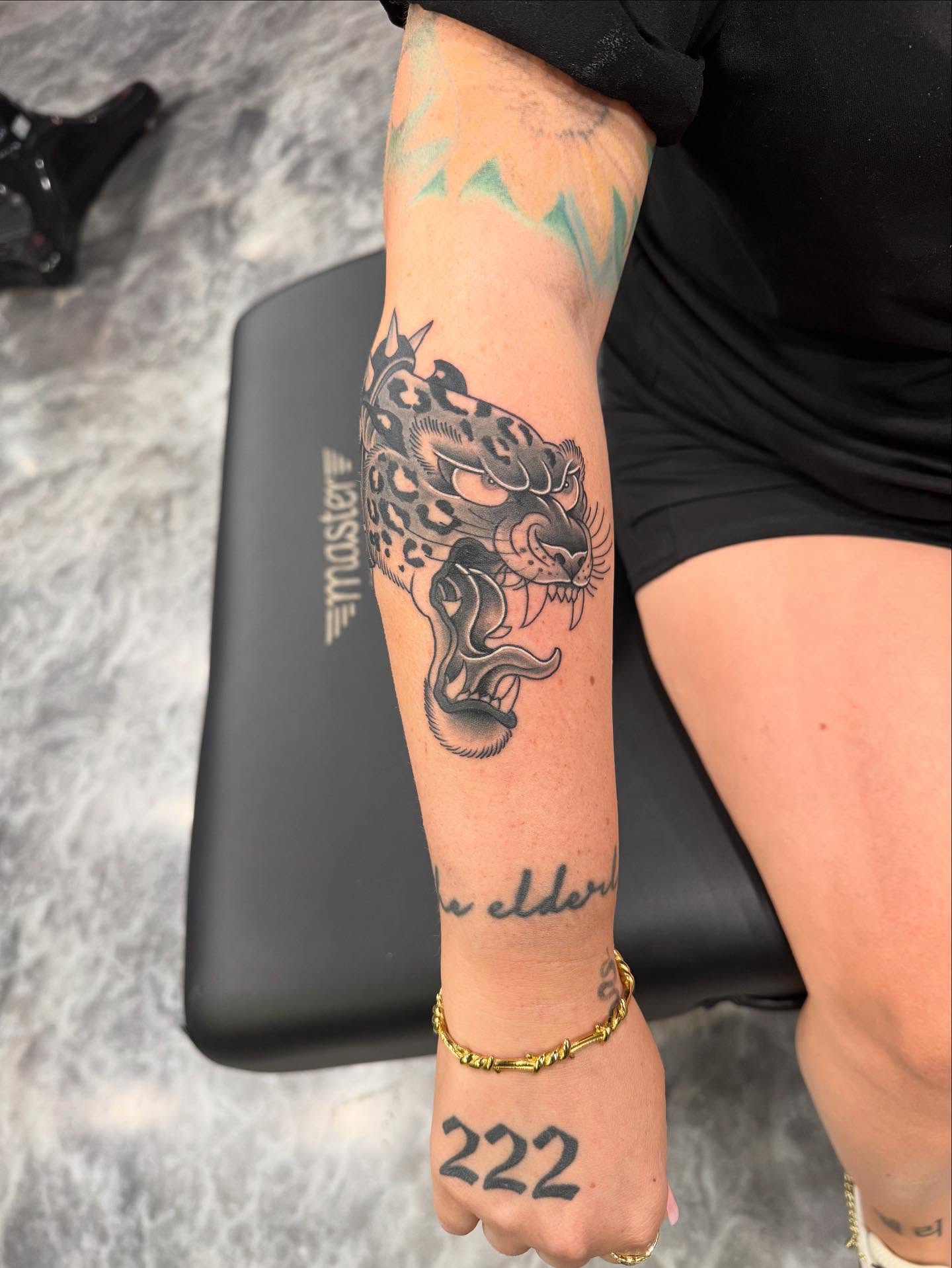 Panther black and grey tattoo on the forearm by Jay Espinoza-AZ Tattooer