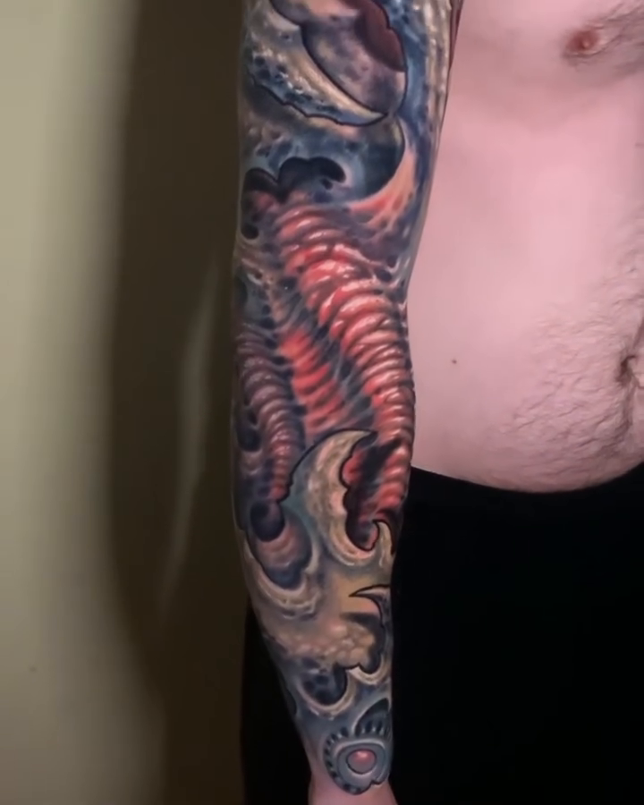 Biomechanical octopus sleeve dark realism tattoo by Ty McEwen Tattoo Artist │ Bioorganic │
