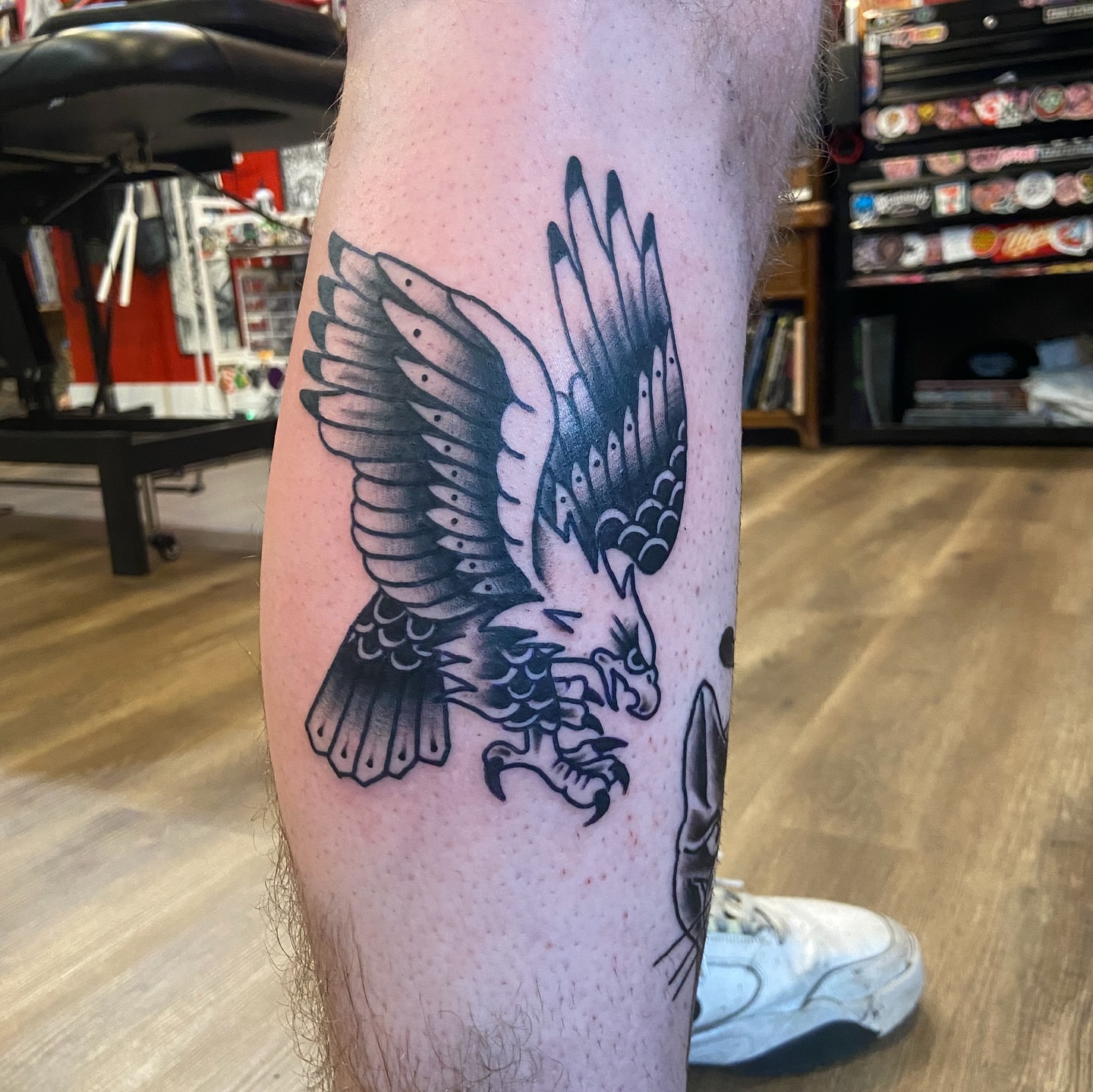 Eagle black and grey tattoo on the forearm by Anthony Robles