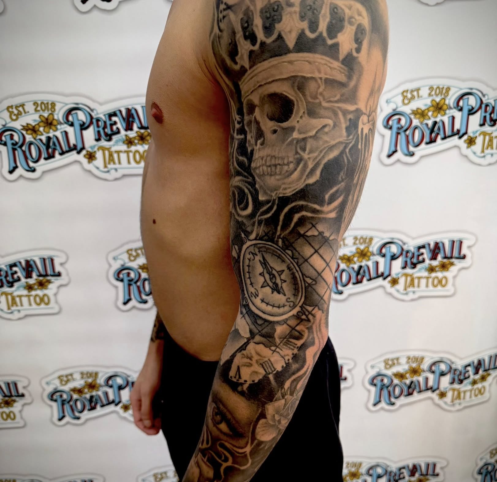 Skull and compass realism tattoo on the forearm by Paul Calhoun Tattoos, Englewood, Ohio