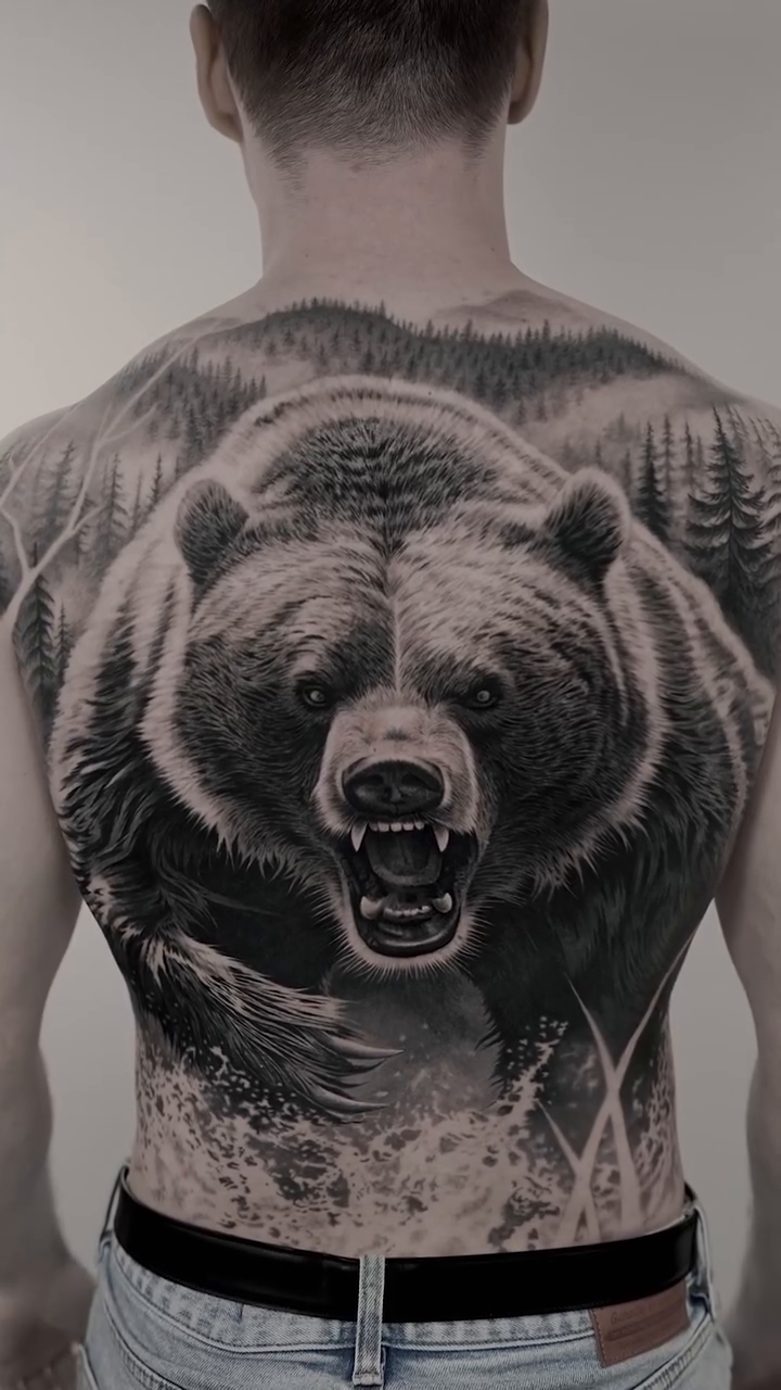 Bear and forest realism tattoo by Jesus Alonso