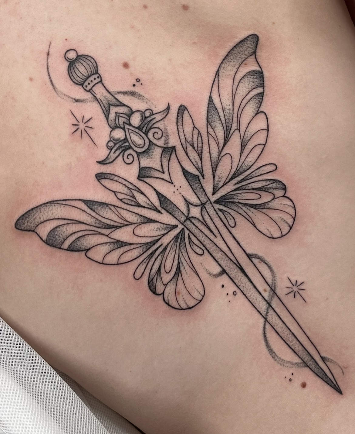 Sword and butterfly dotwork tattoo on the chest by ✩gracie ⋆｡°✩