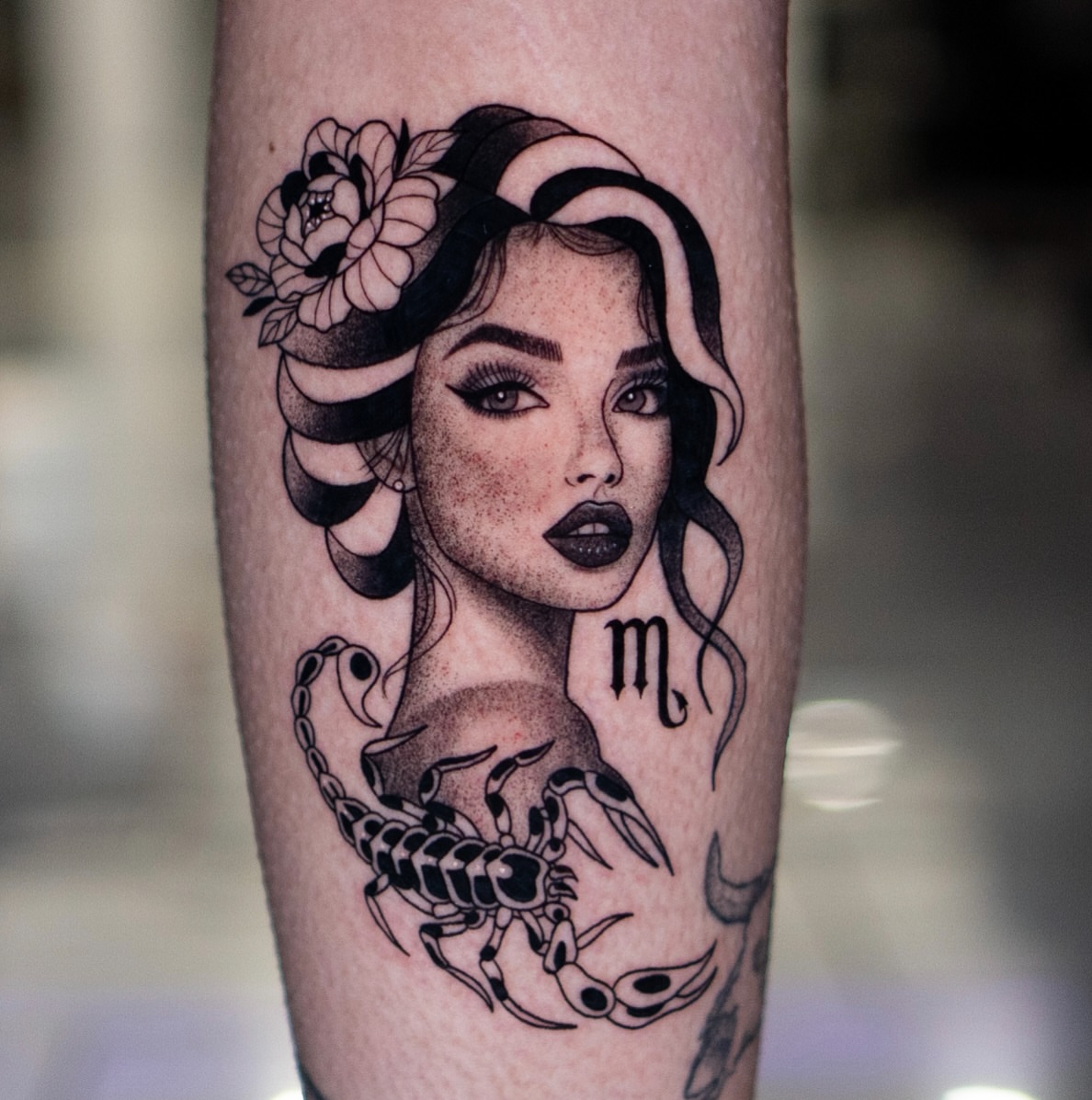 Woman with scorpion dotwork tattoo on the forearm by Jorden Ruppe