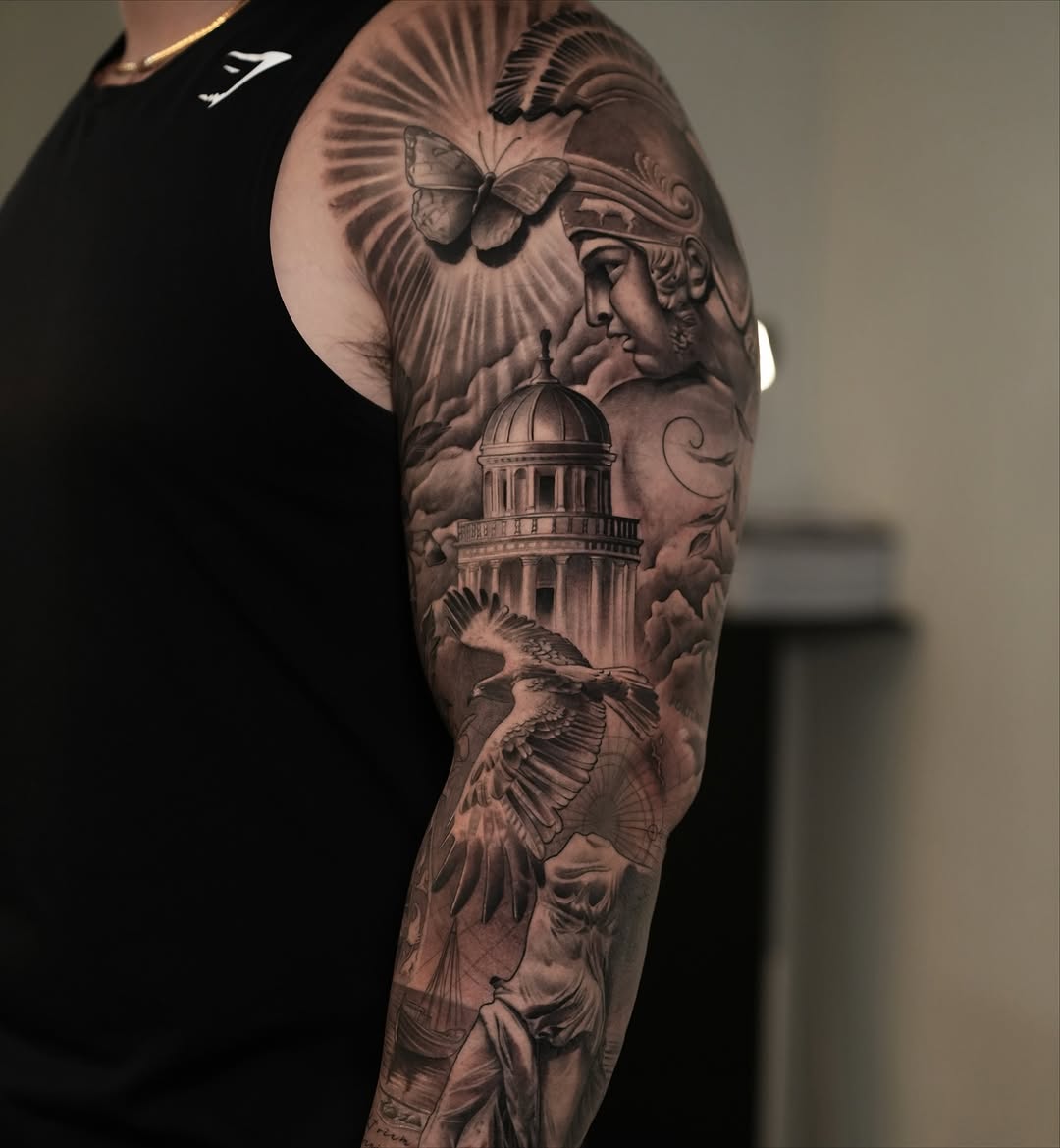 Classical architecture and mythology sleeve realism tattoo on the upper arm by J O S S I e L P I N e D A