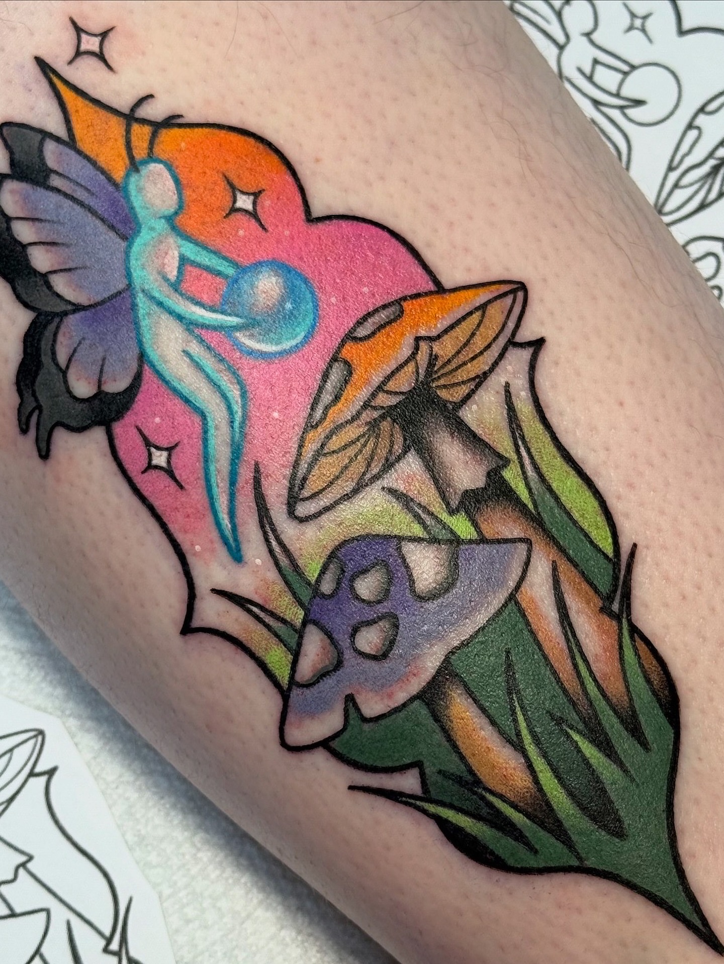 Fairy and mushrooms American traditional tattoo on the forearm by vic
