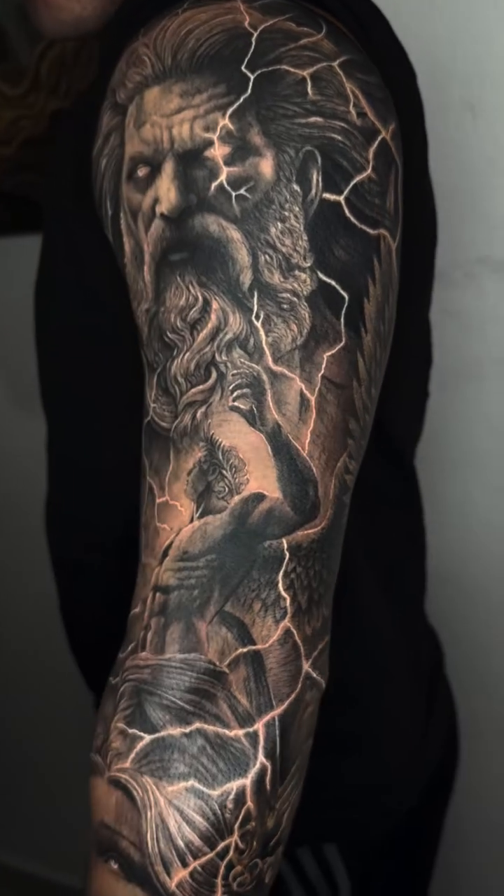 Tattoo by @elmertattoo1 — realism, black_and_grey