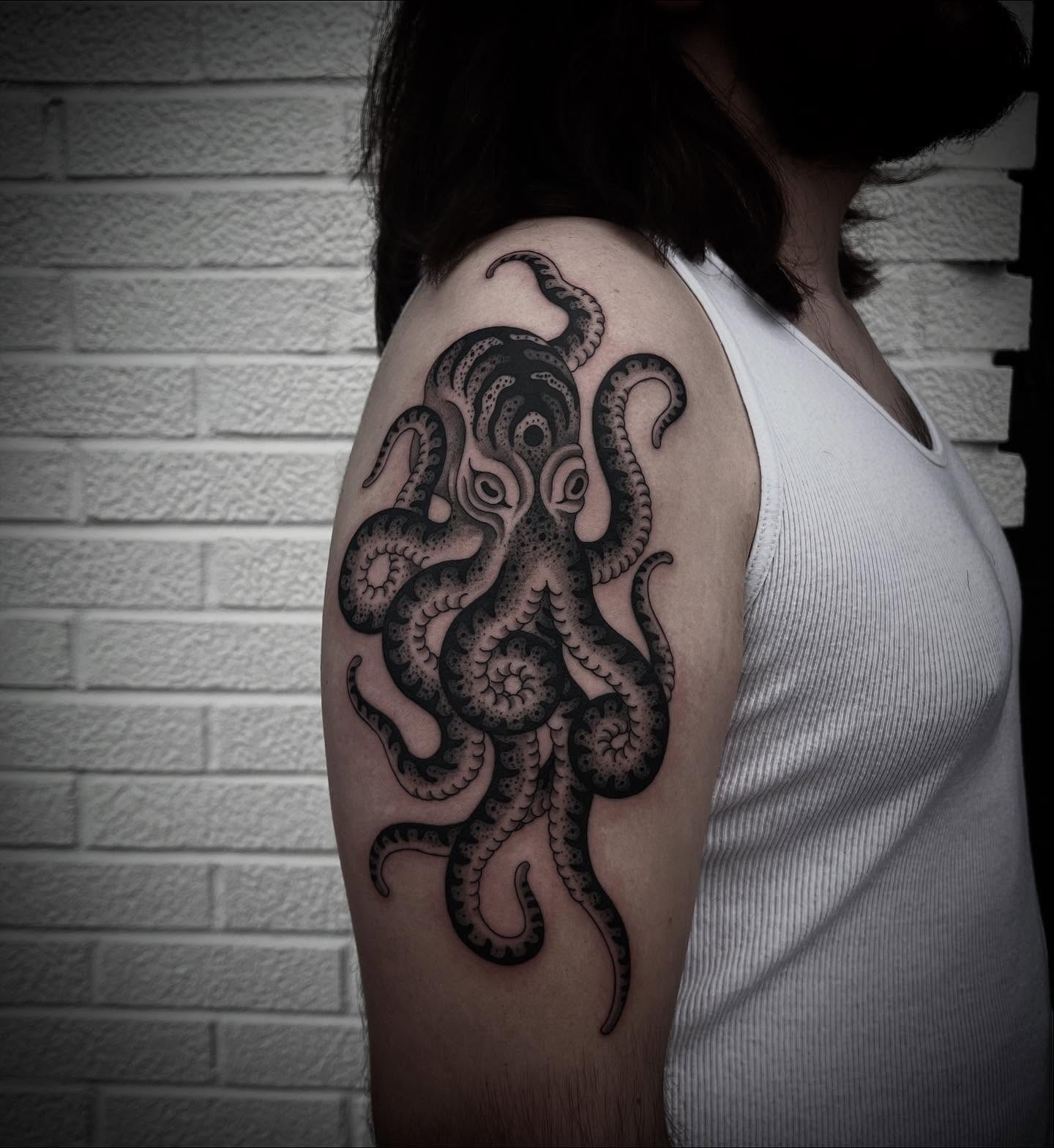 Octopus dotwork tattoo on the shoulder by linahsiaotattoo