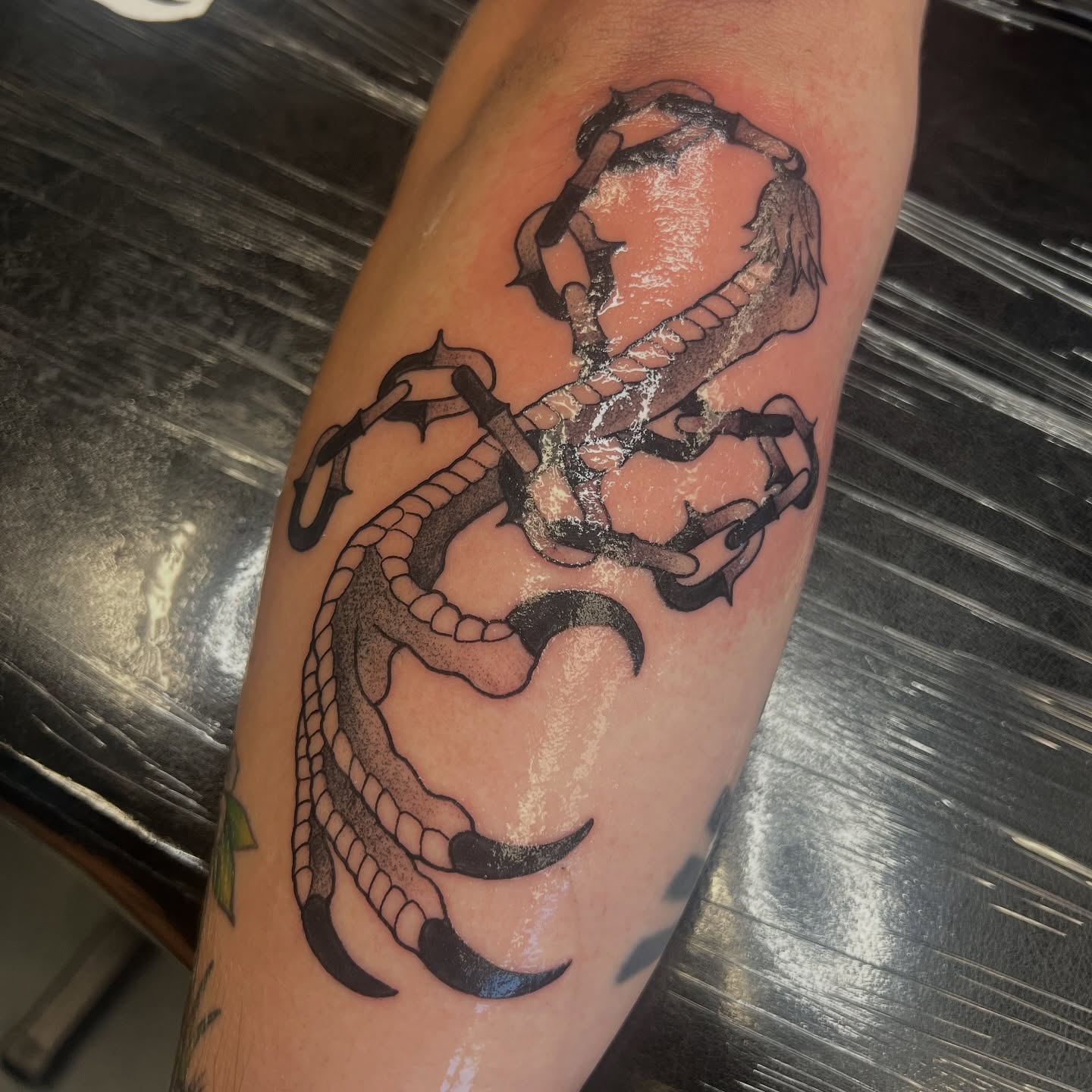 Scorpion black and grey tattoo on the forearm by Leslie Paskoff