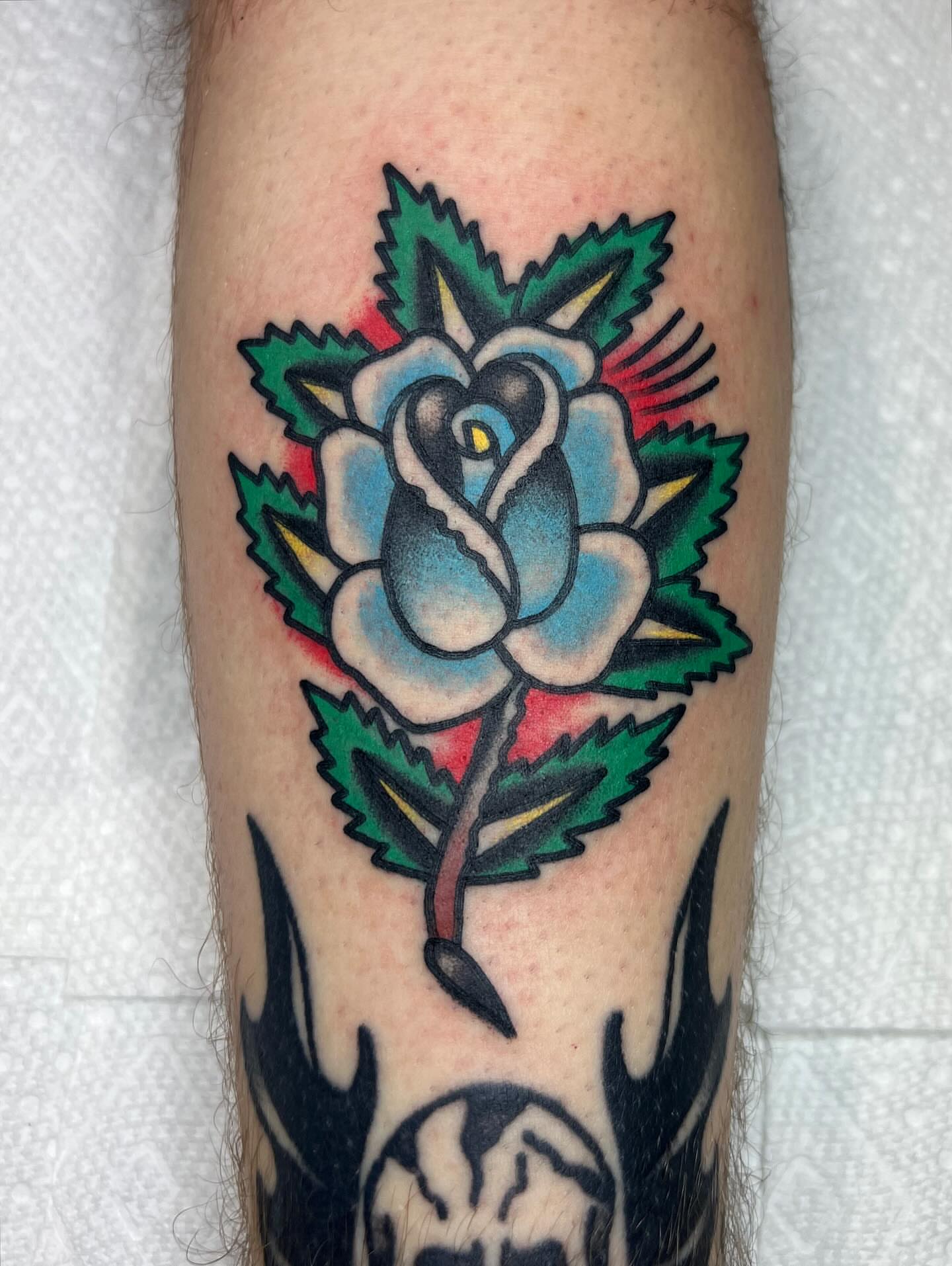 Rose American traditional tattoo on the forearm by Tattoo