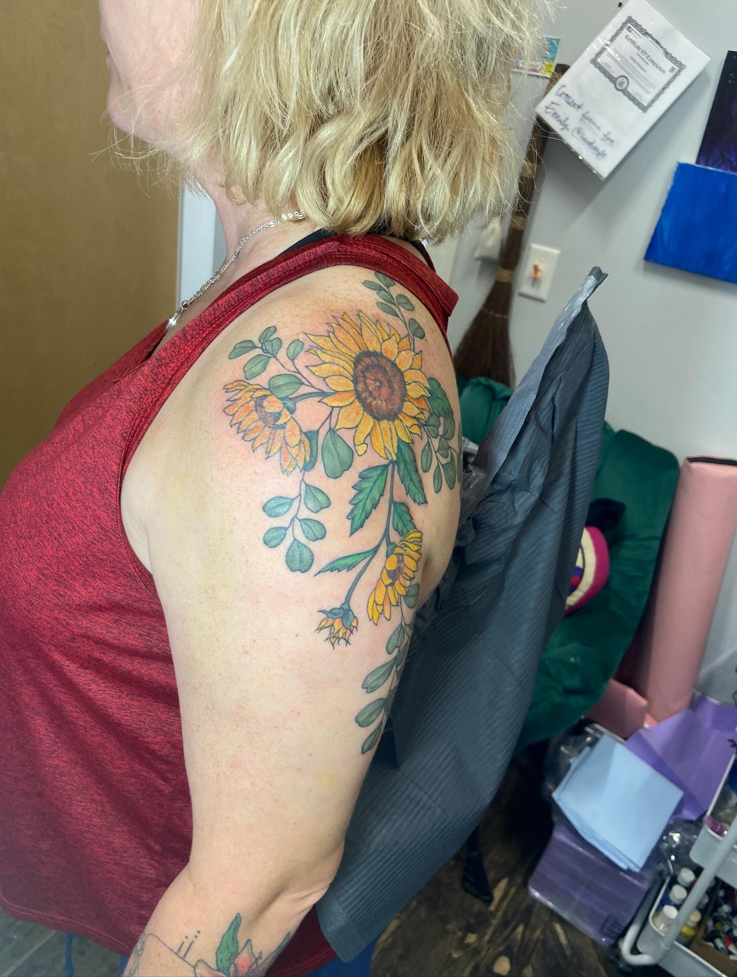 Sunflower and leaves American traditional tattoo on the shoulder by Dont Worry About It