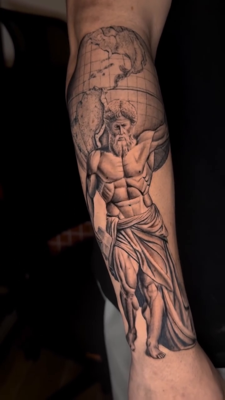 Atlas holding the world realism tattoo by Tiago Britto
