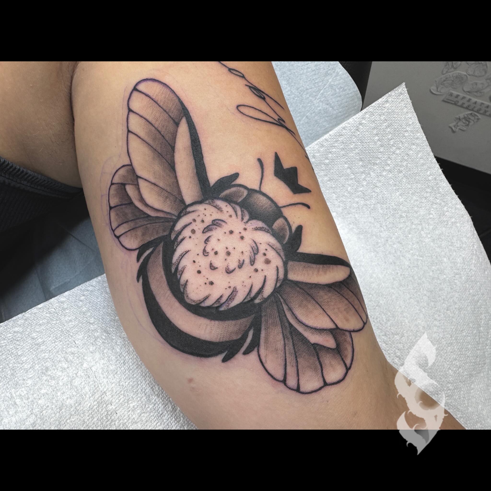 Bee black and grey tattoo on the forearm by Amanda Stampfly