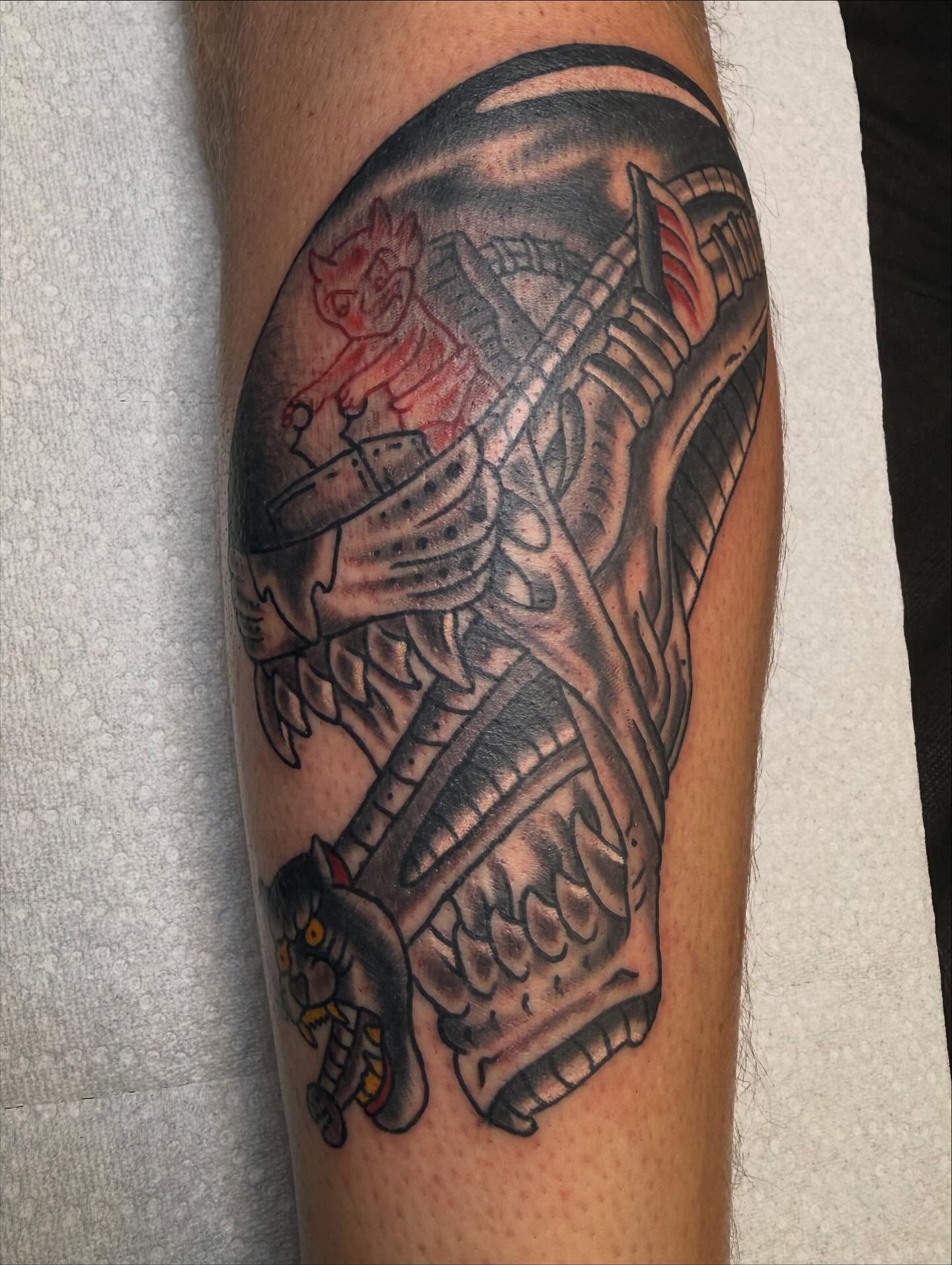 Mecha black and grey tattoo on the forearm by Brendan Willbern, Austin, Texas