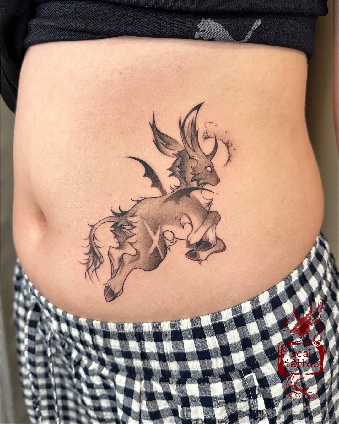 Winged creature fine line tattoo on the torso by scaitattoo