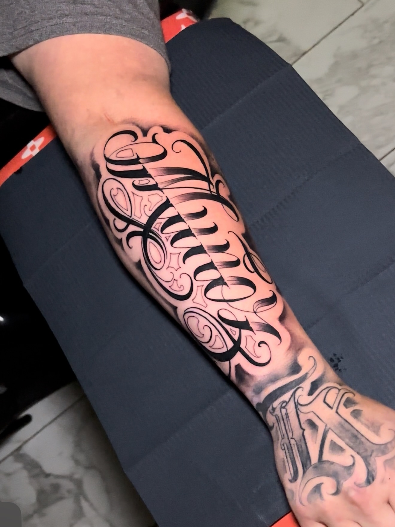 Script lettering lettering script tattoo on the forearm by Erick @ AZTEC_TATT