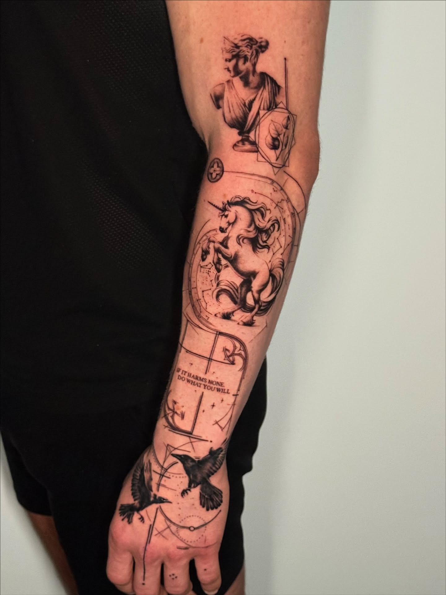 Mythical creature and shield realism tattoo on the forearm by Moi Rivas, Salt Lake City, Utah
