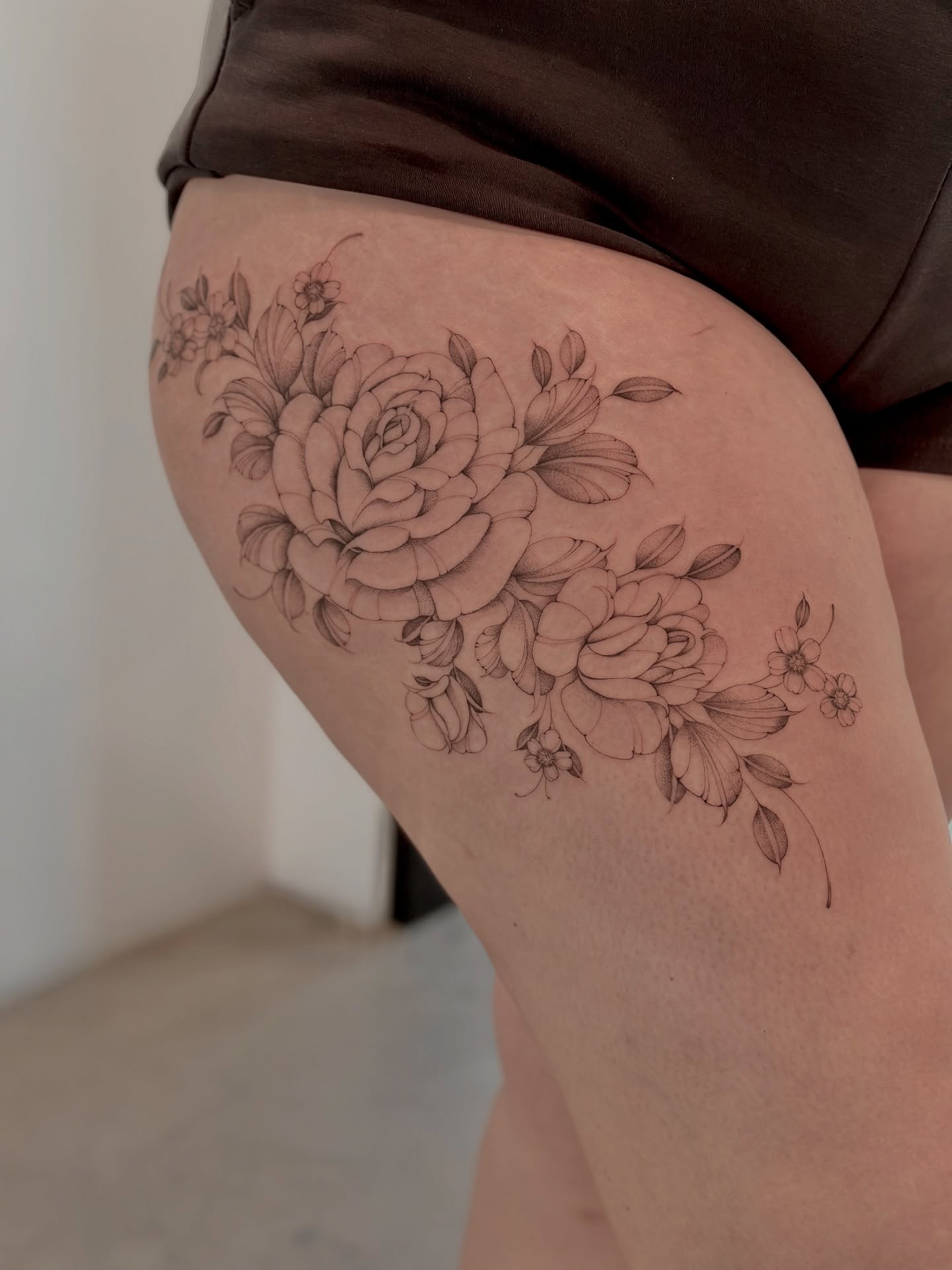 Floral bouquet realism tattoo on the thigh by ᴍɪᴄʜᴇʟʟᴇ, New York, New York