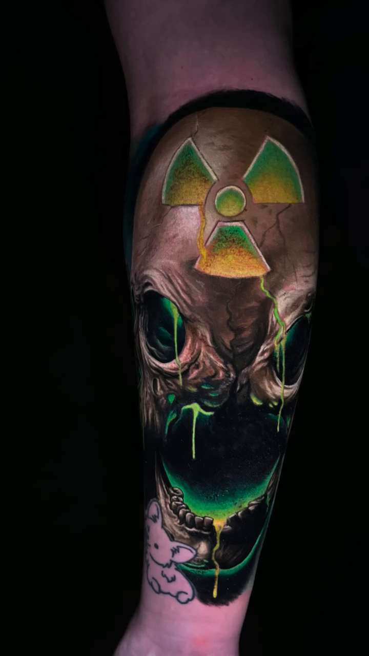 Skull with biohazard symbol realism tattoo by 🦇𝖀𝖙𝖆𝖍🦇, Las Vegas, Nevada