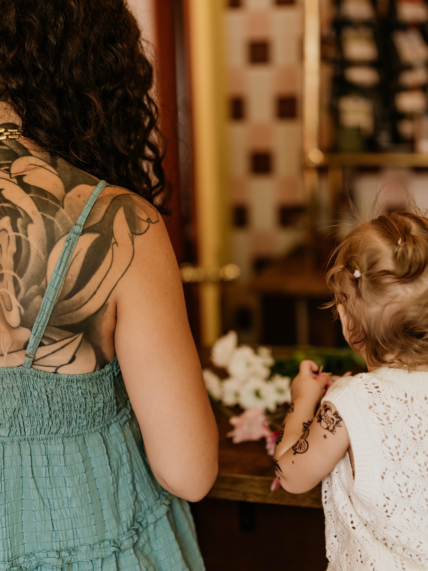 Flower American traditional tattoo on the back by Kyla Jae