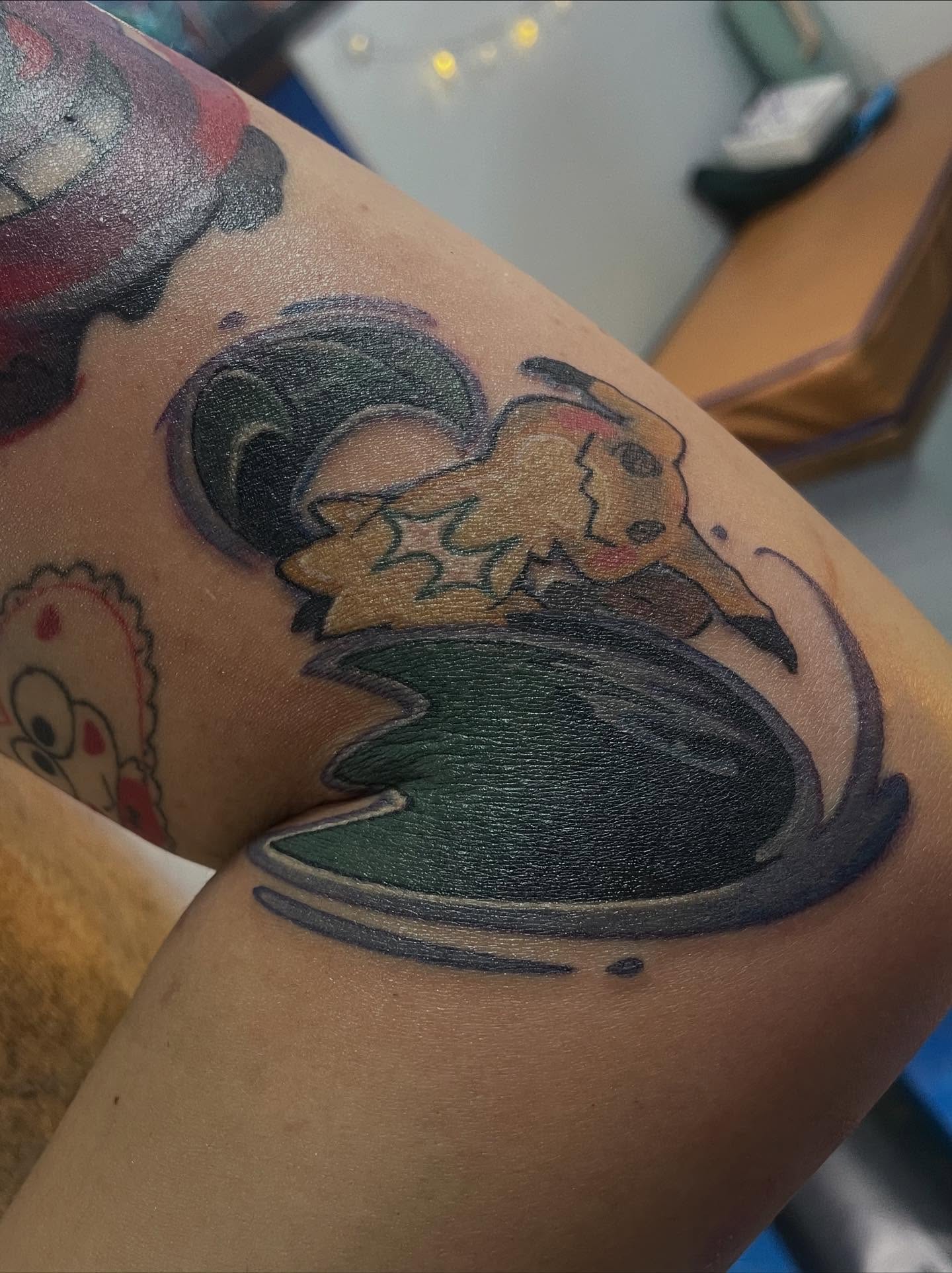 Pikachu American traditional tattoo on the forearm by Robin Wintringham