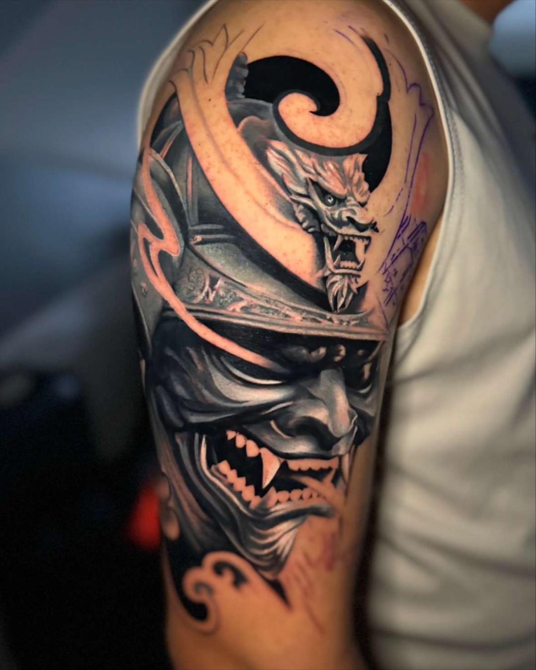 Demon mask japanese irezumi tattoo on the shoulder by Inexor tattoos