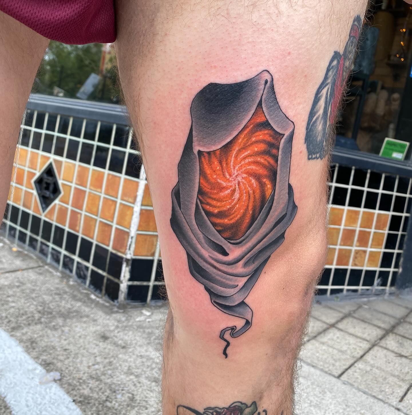 Whirlpool realism tattoo on the thigh by Kyle Kozek, Columbus, Ohio