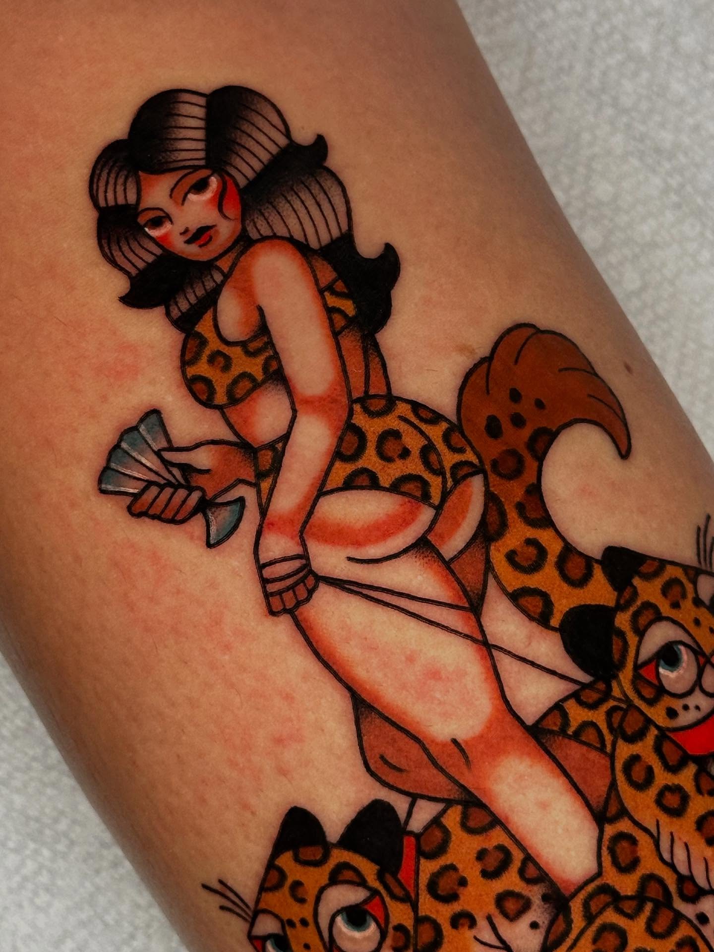 Woman with leopard American traditional tattoo on the thigh by π»πππππ πΉπππ