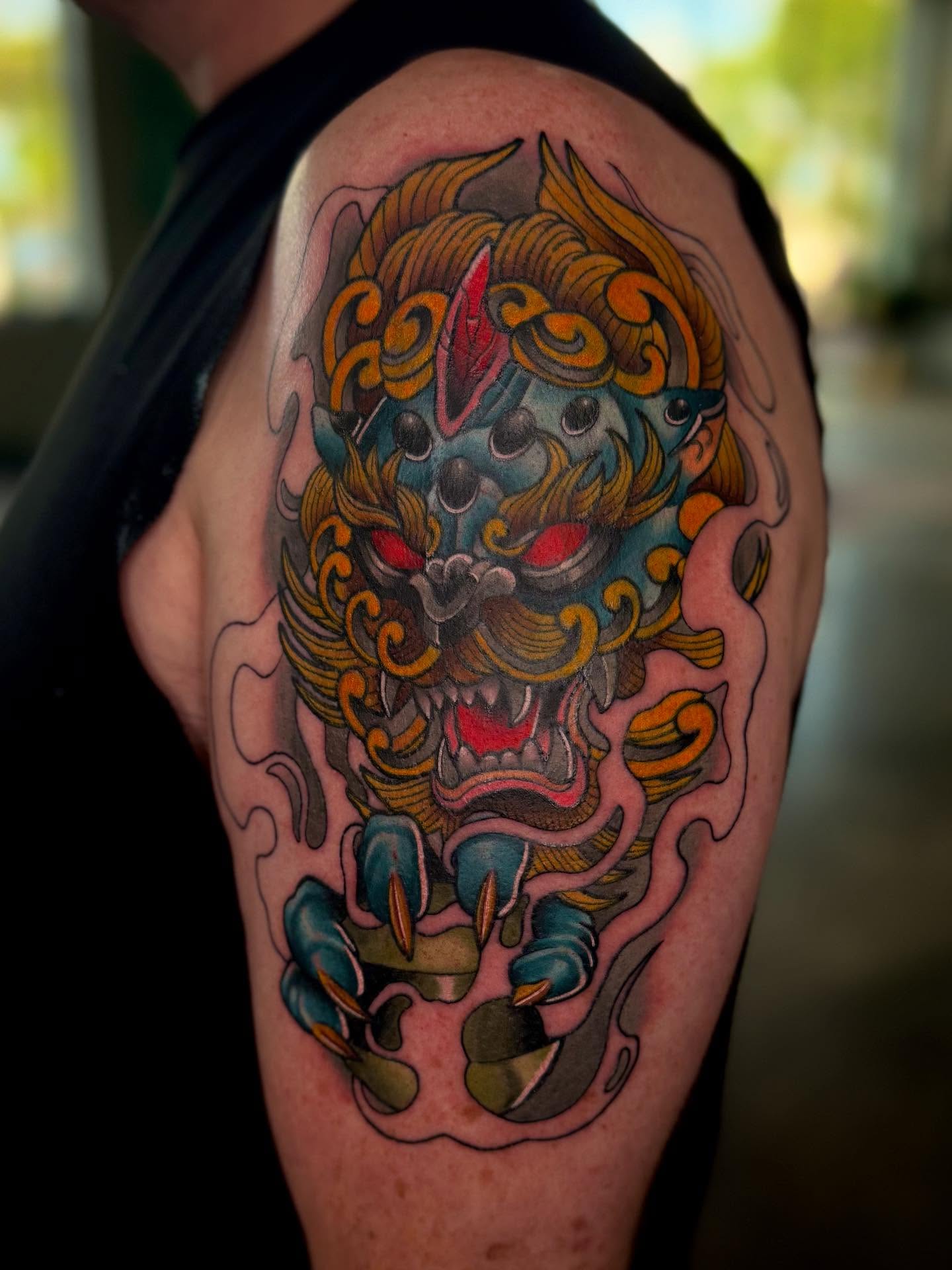 Lion japanese irezumi tattoo on the shoulder by Sam Babcock