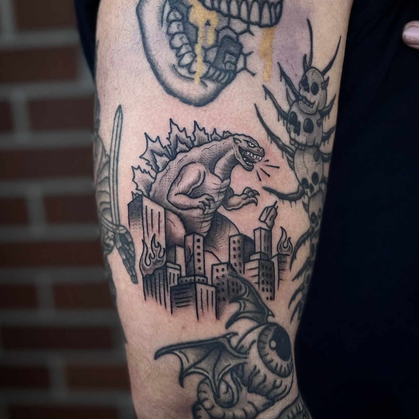 Godzilla realism tattoo on the forearm by Lauren Dempsey, Dearborn, Michigan