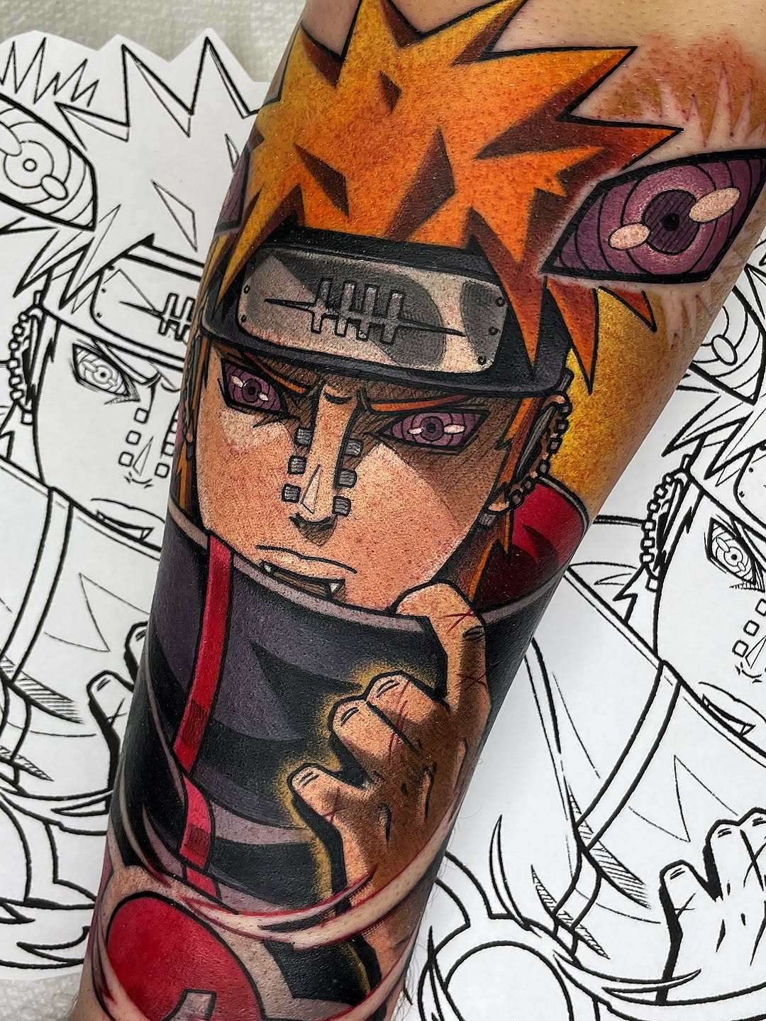 Pain from Naruto anime tattoo on the forearm by Bold Anime Tattoos