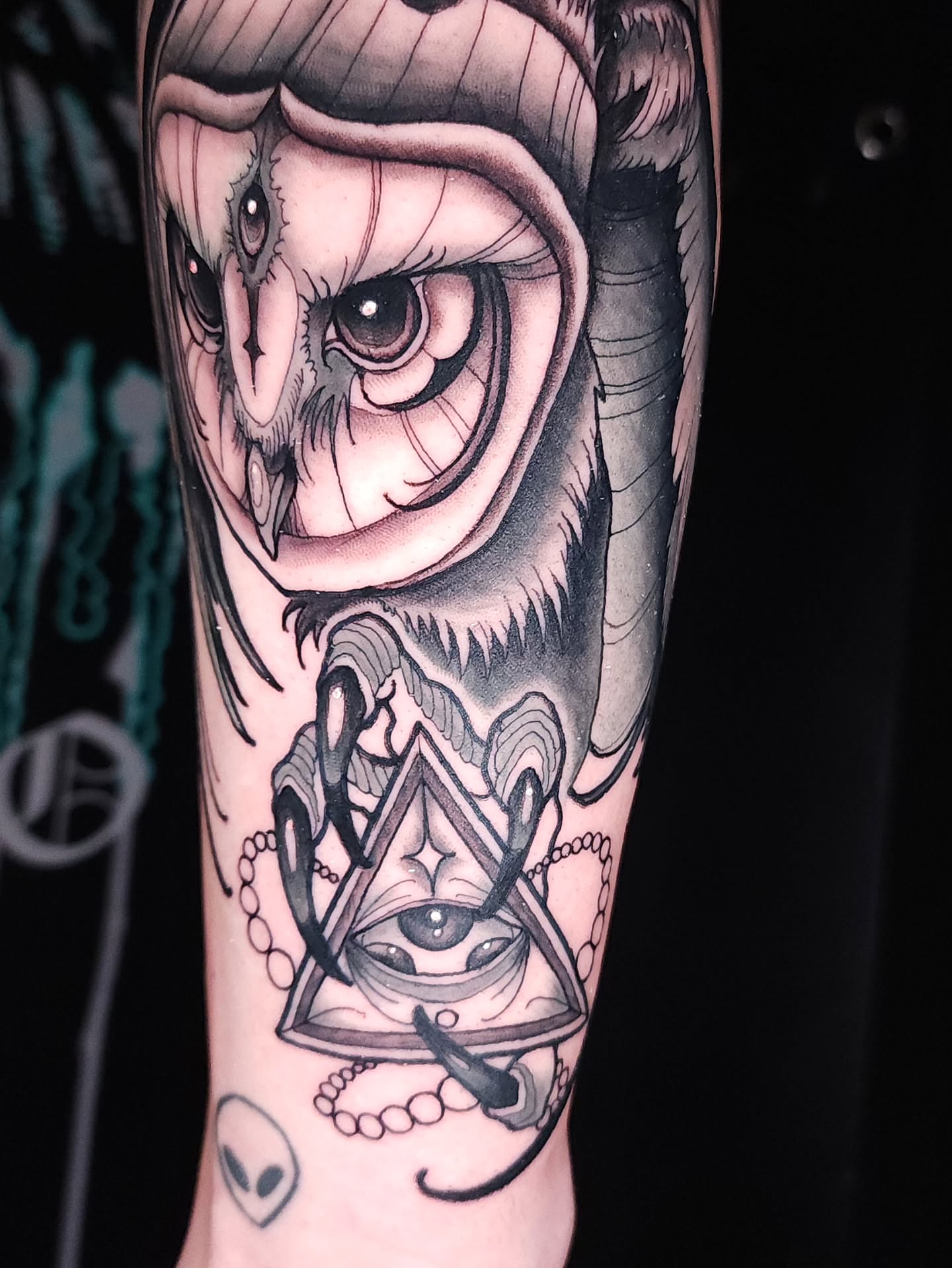 Owl and pyramid realism tattoo on the forearm by Mario Romero
