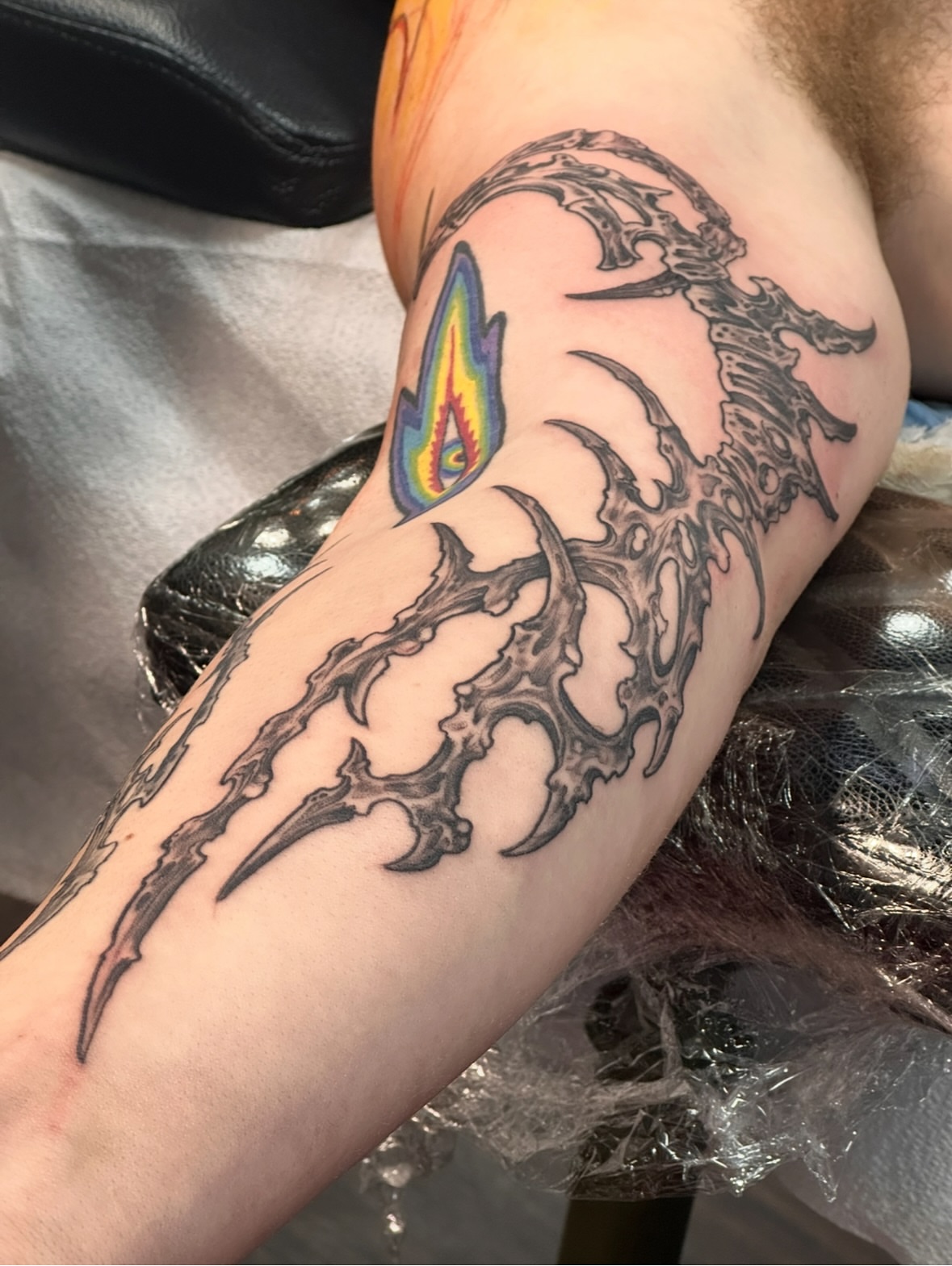 Tribal dragon tribal tattoo on the forearm by Culleton Paramore