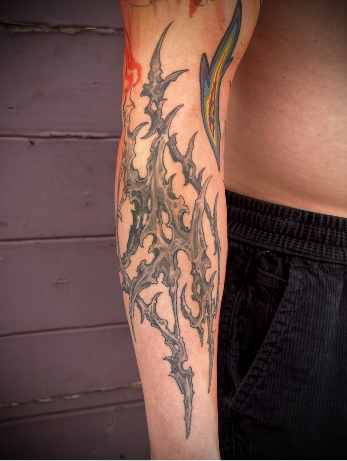 Flame tribal tattoo on the forearm by Culleton Paramore