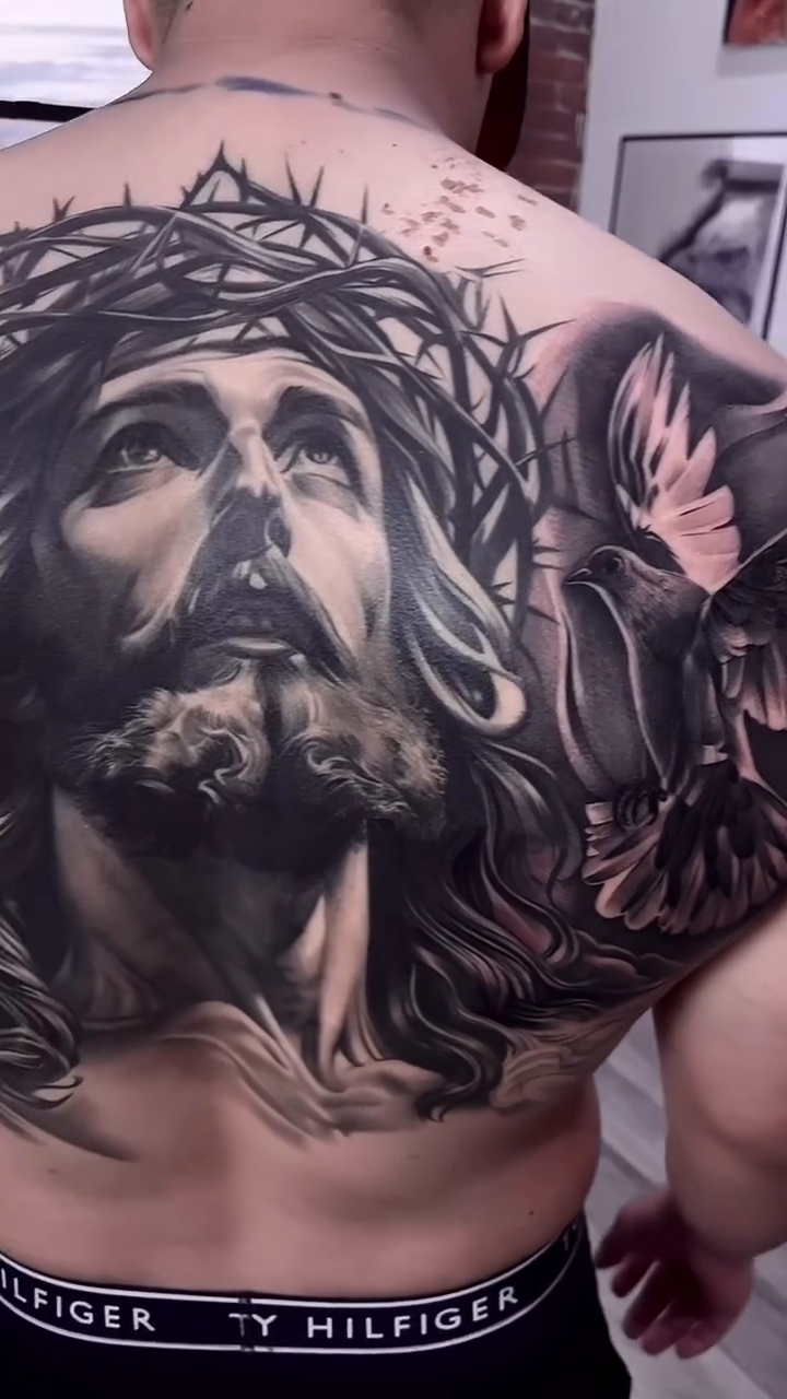 Jesus christ and doves realism tattoo by Erick Gutierrez, Las Vegas, Nevada