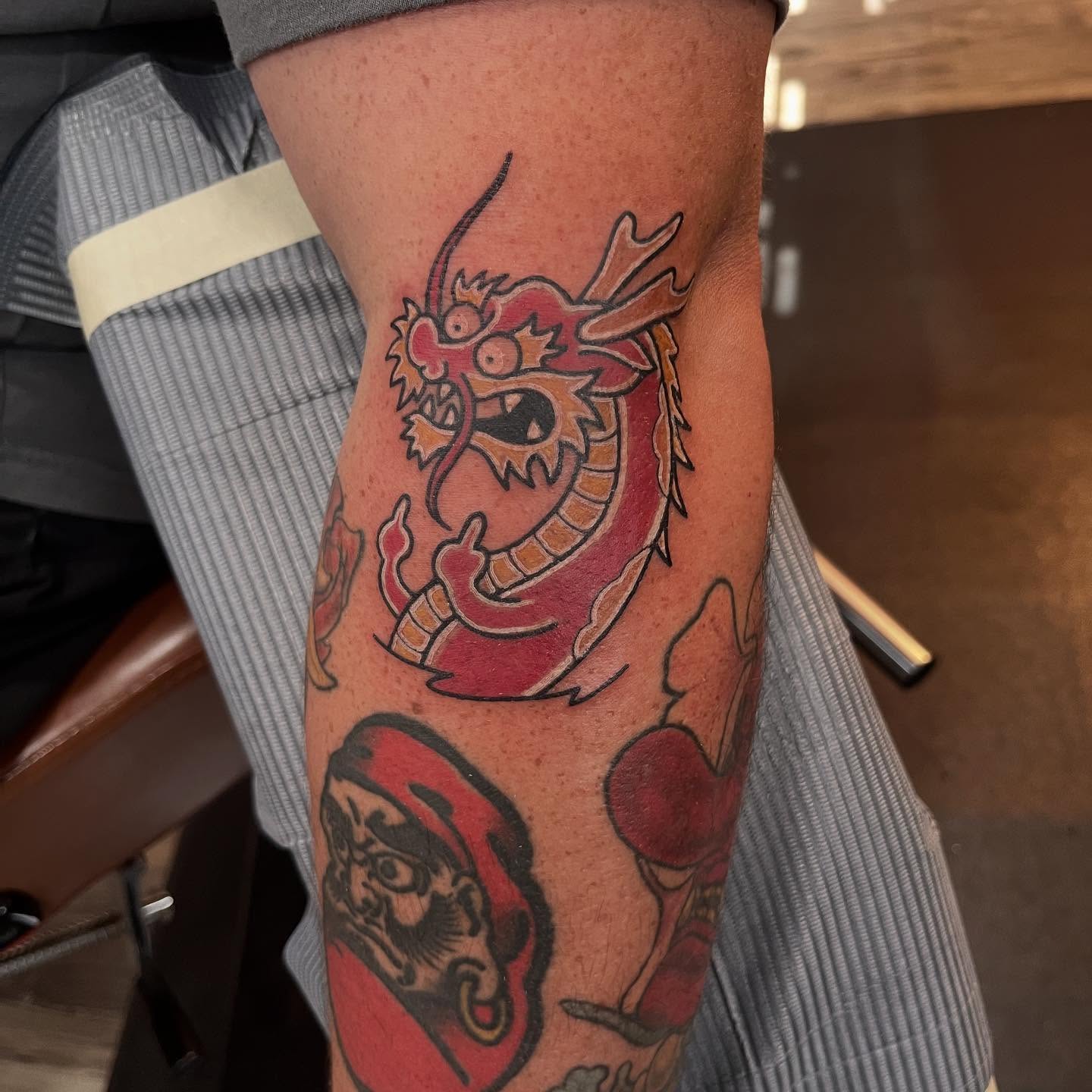 Dragon American traditional tattoo on the forearm by Brandie Caroline, Somers Point, New Jersey