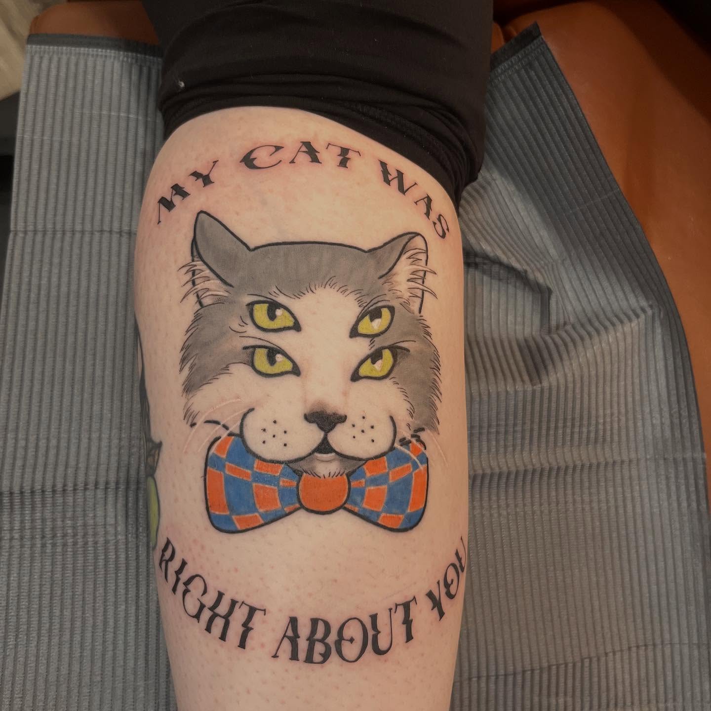 Cat wearing bow tie American traditional tattoo on the forearm by Brandie Caroline, Somers Point, New Jersey
