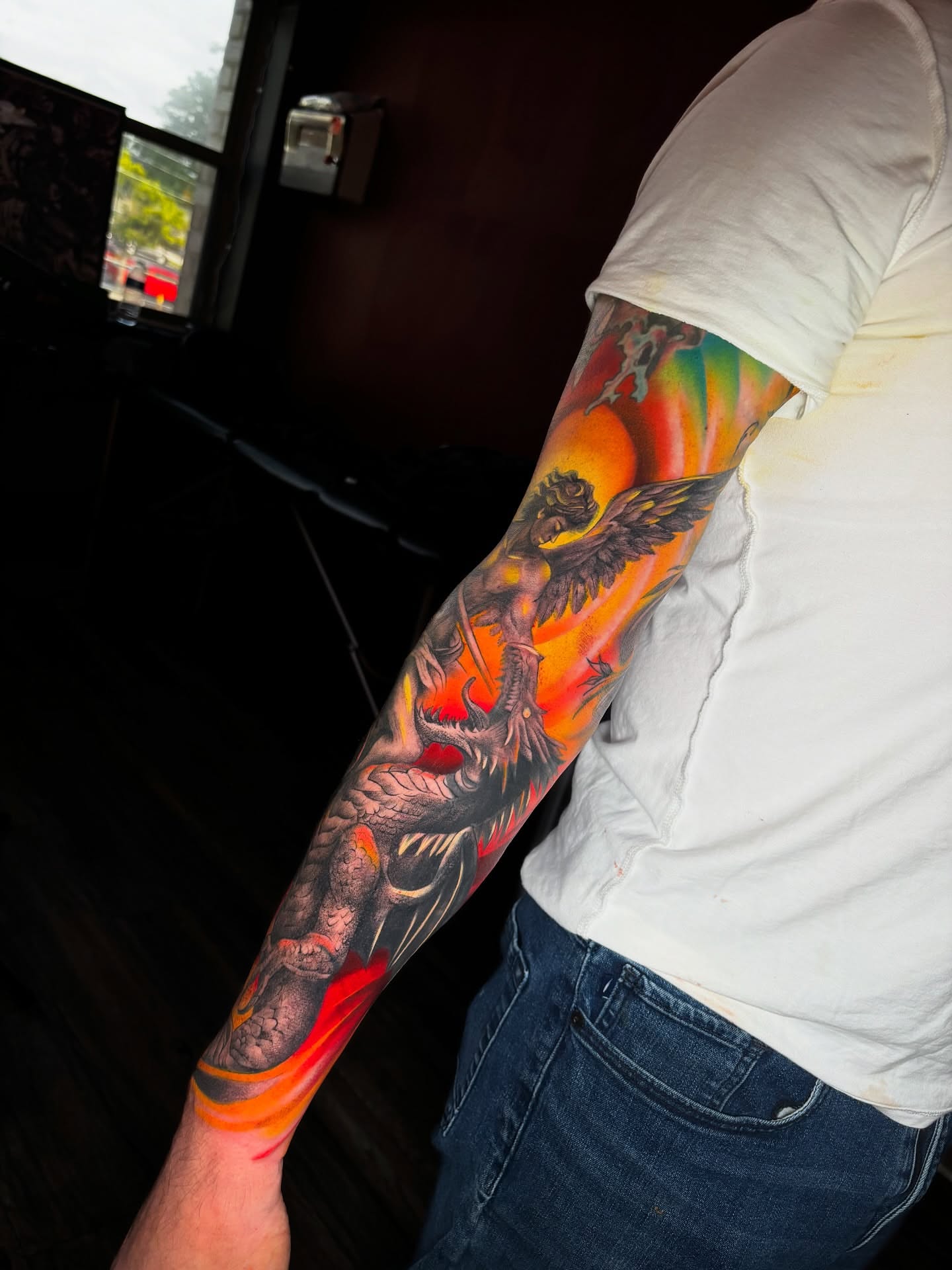 Winged creature American traditional tattoo on the forearm by Franz Muñoz