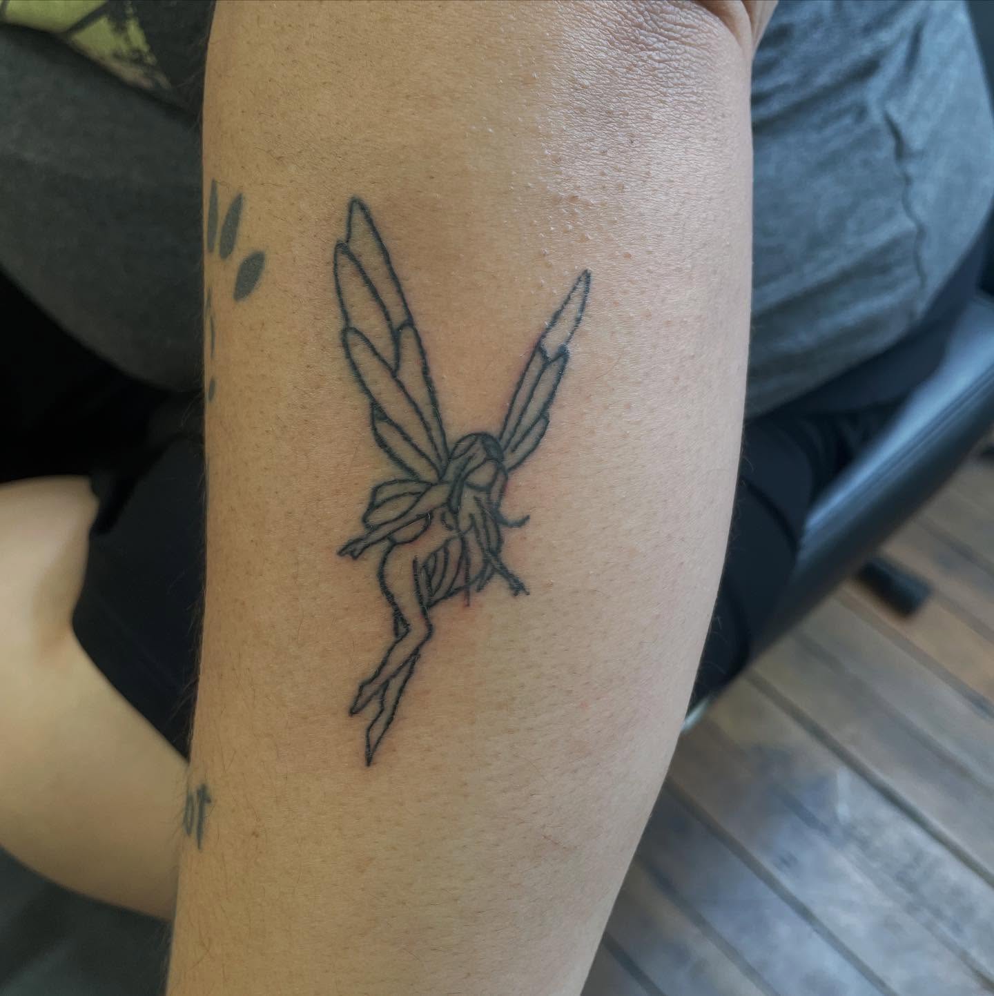 Fairy black and grey tattoo on the forearm by Whimsy Ink