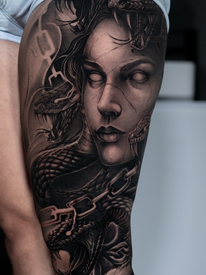 Woman with snakes realism tattoo on the forearm by Angel Gonzalez