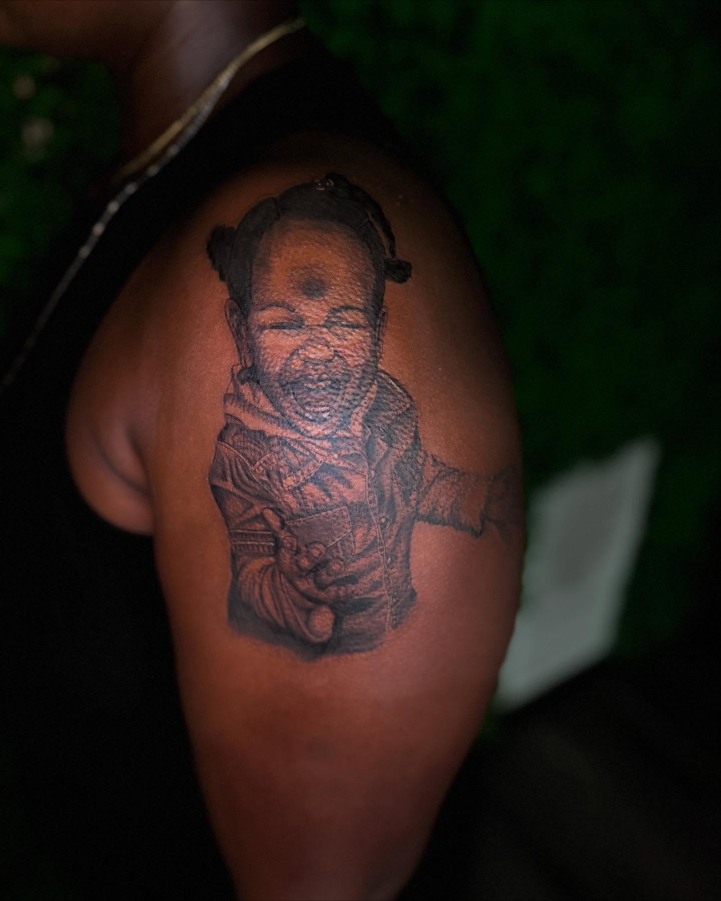 Baby realism tattoo on the shoulder by Los Angeles Tattoo Artist