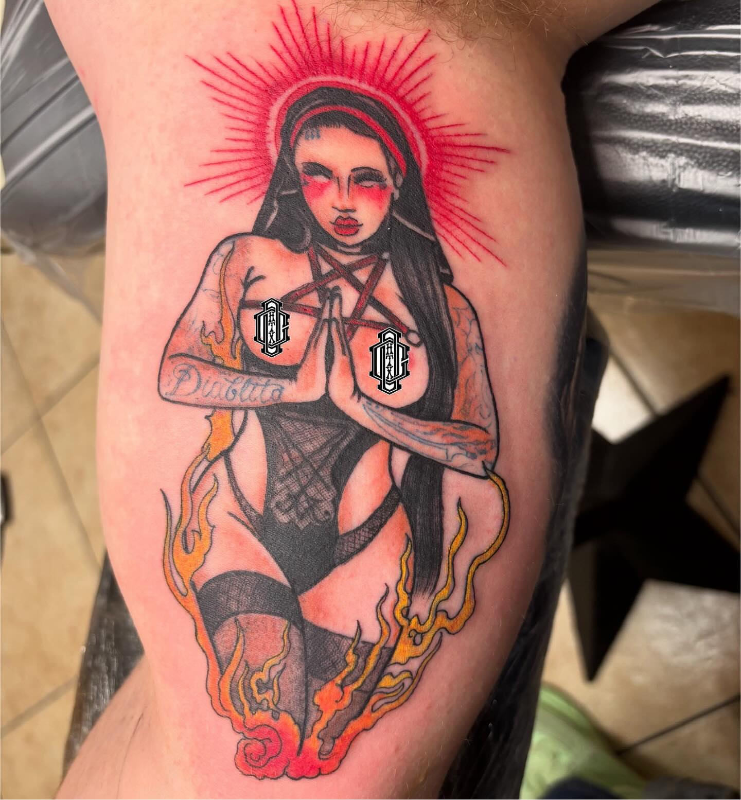 Religious figure American traditional tattoo on the thigh by Oscar Cuéllar (Kue-Yar)