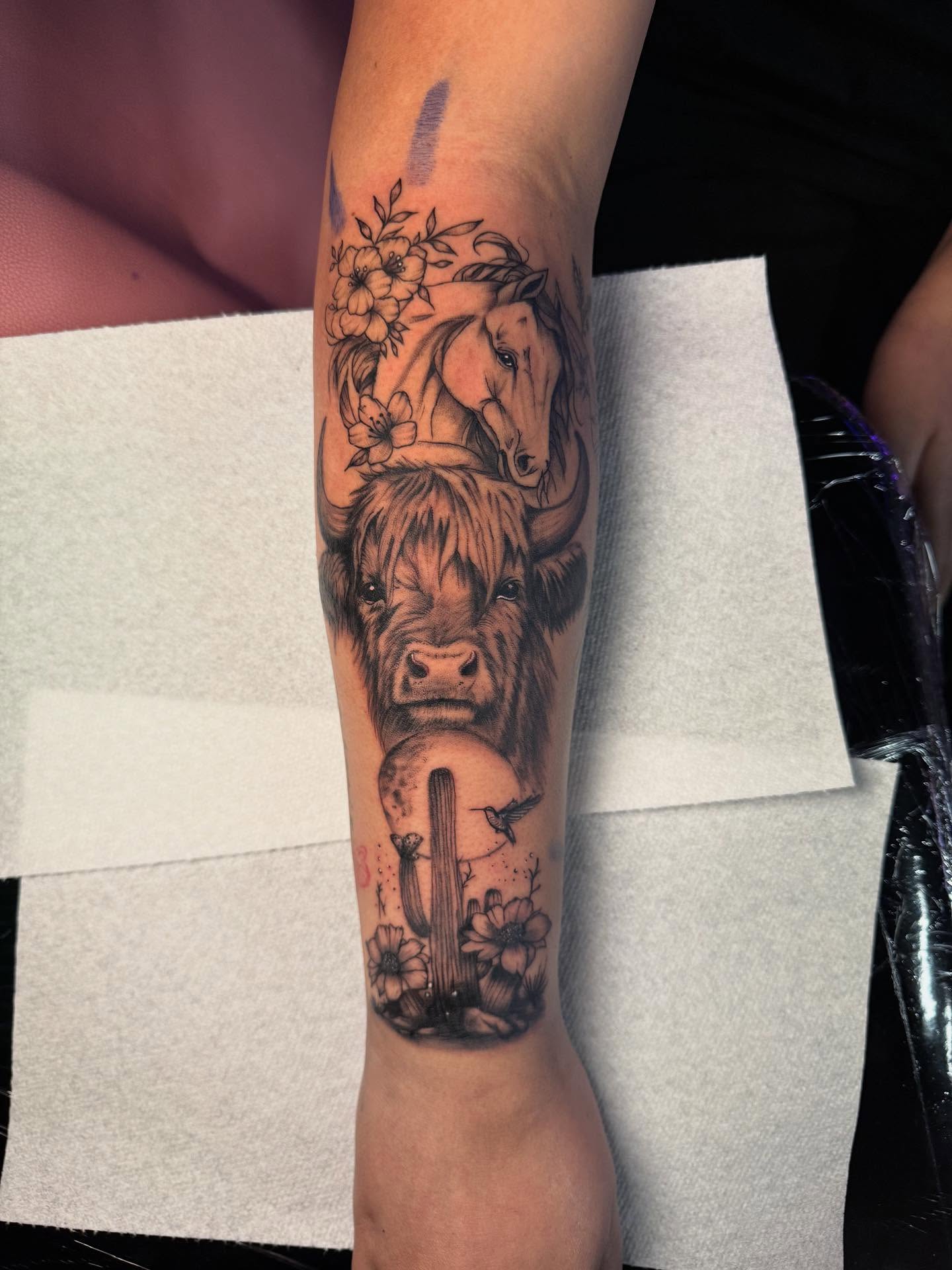 Highland cow realism tattoo on the forearm by Jasmin Lozano