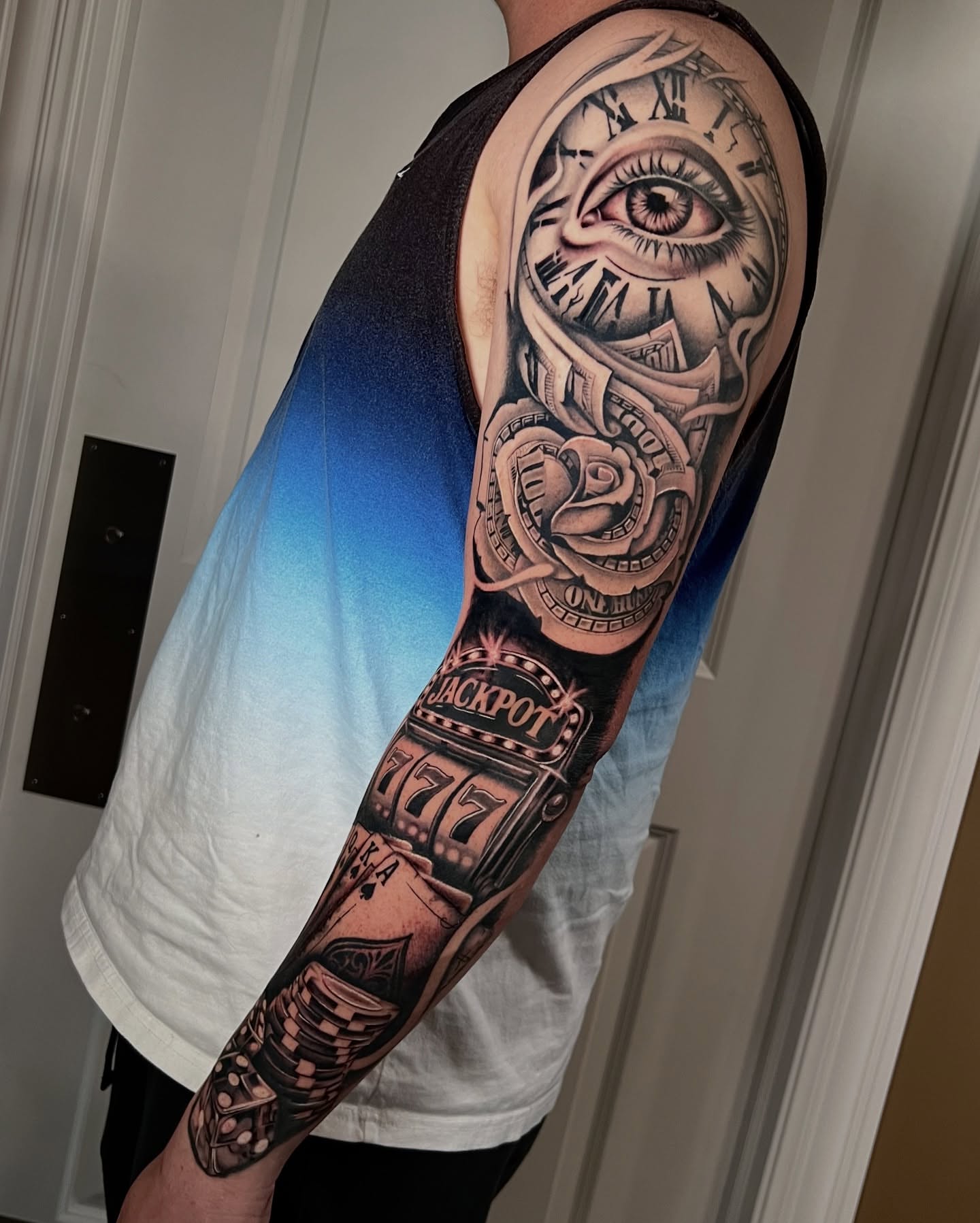 Eye and clock realism tattoo on the forearm by Nick Monastra