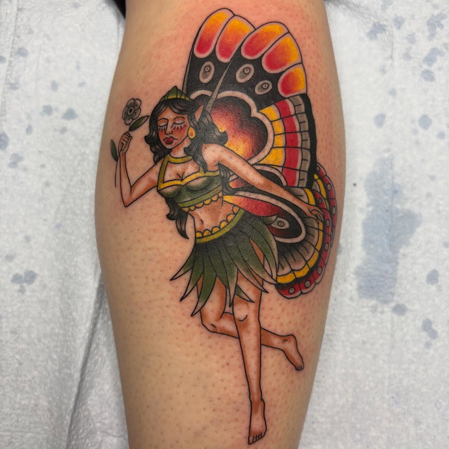 Butterfly dancer American traditional tattoo on the thigh by Jakob Ristau, Kansas City, Missouri
